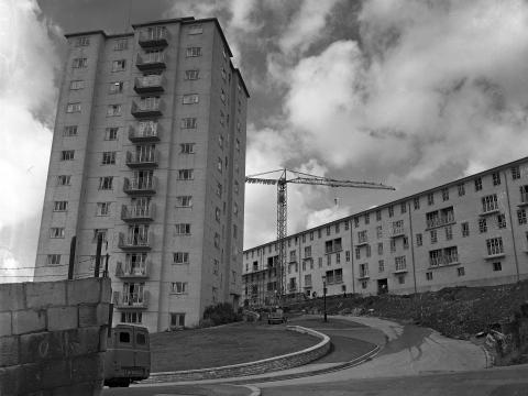 Black and white photo of block of flats